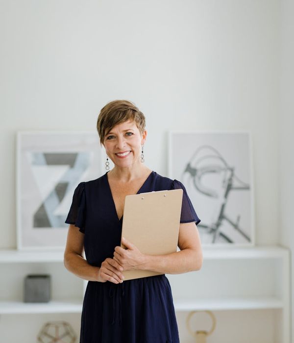 Portrait of the instructor Olga Zarichna, smiling warmly.